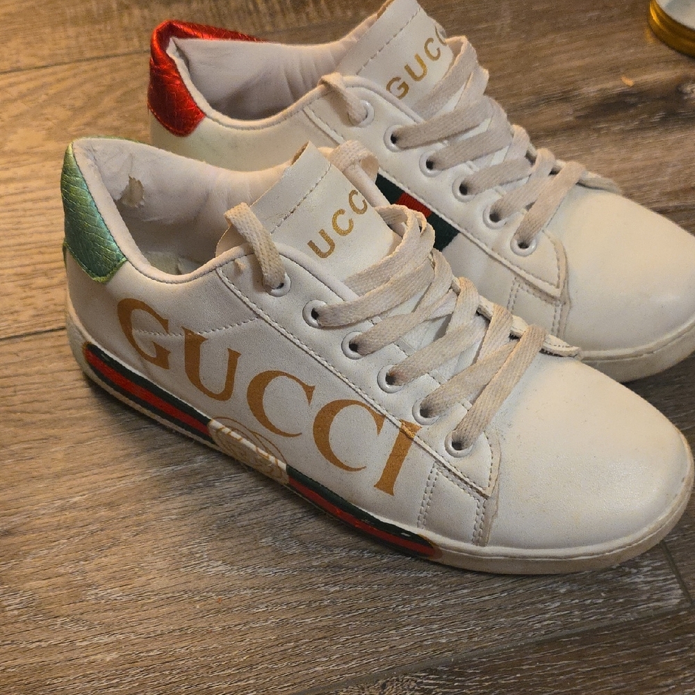 Gucci White Sneakers with Gold Lettering and Red-Green Details